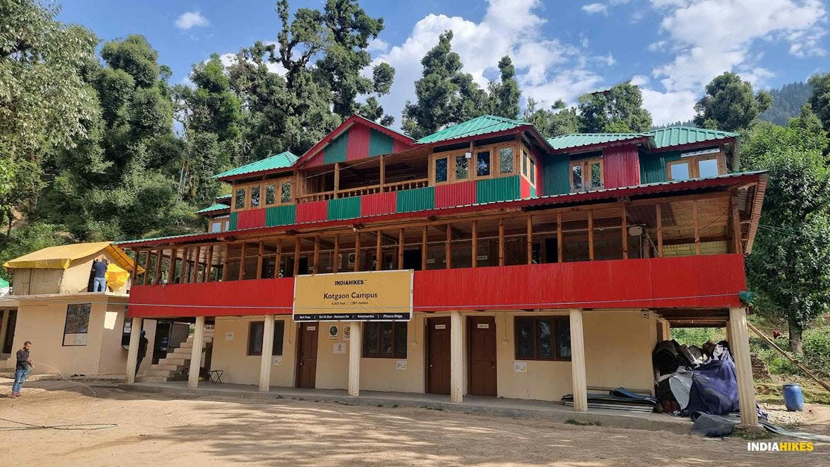 Indiahikes Kotgaon campus building made using traditional architecture and bright colours. 