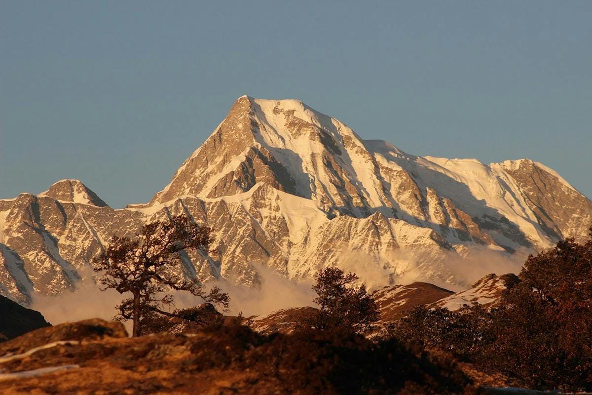 A clear photo of Mount Nanda Ghunti under clean sky at winter